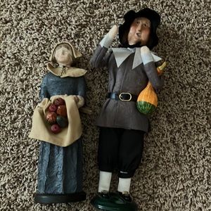 A man from the Carolers Collection 1996.  The woman is very light weight with no